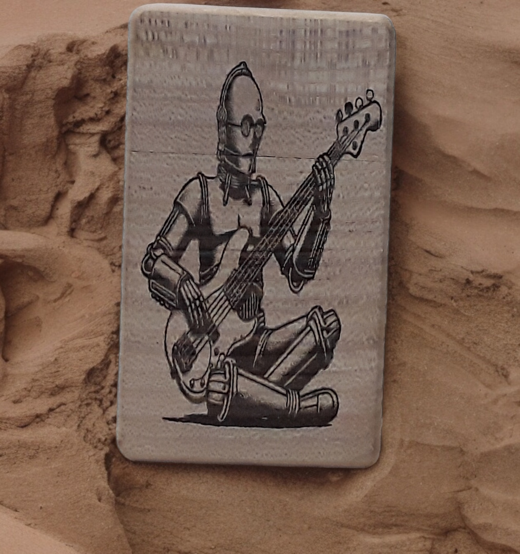 Image of a greenfoxx dugout C3PO Playing Bass